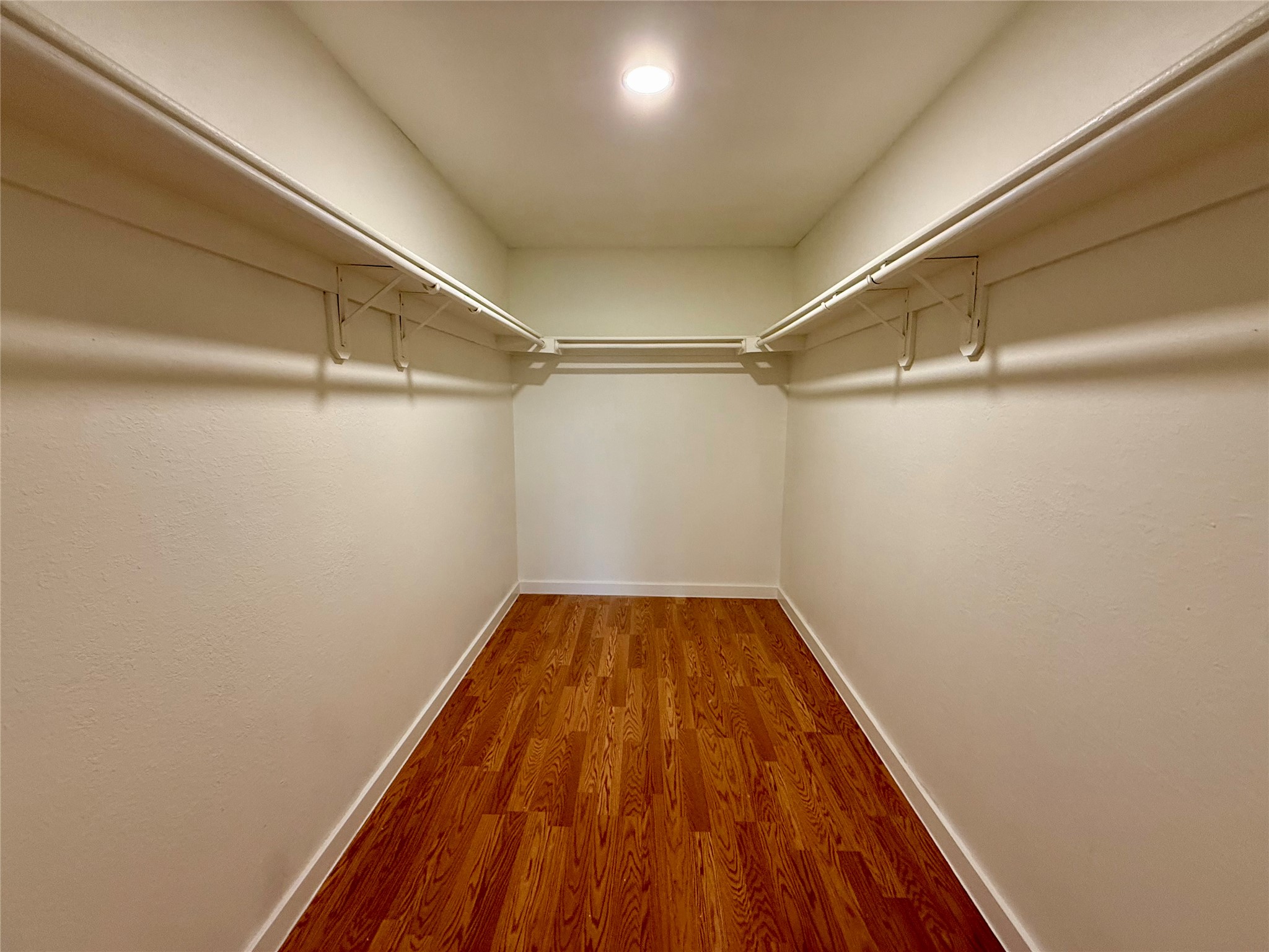 21003 Boggy Ford Road, Unit A Lago Vista, TX 78645 - Photo 11 of 19 a view of a room with wooden floor and staircase