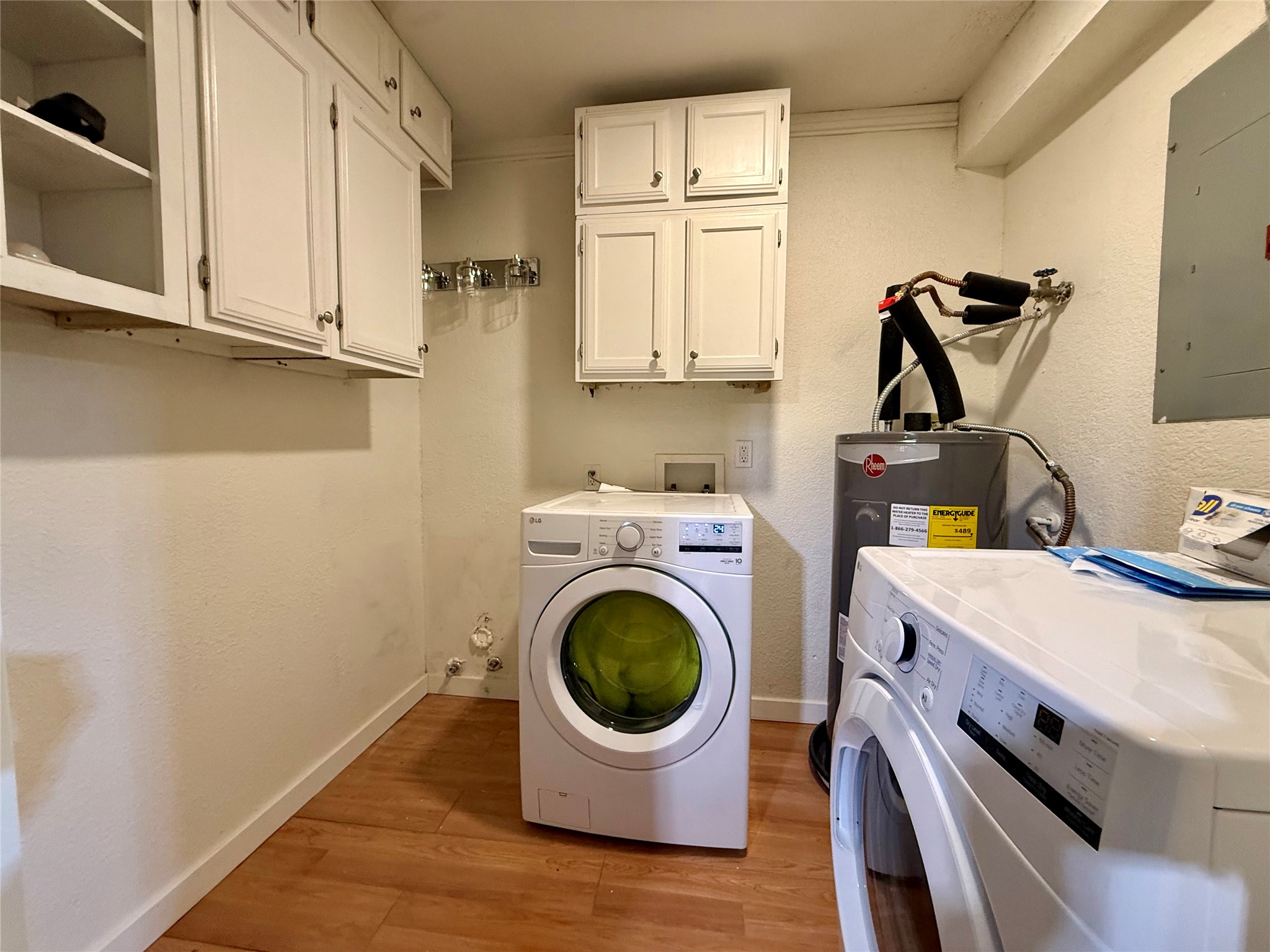 21003 Boggy Ford Road, Unit A Lago Vista, TX 78645 - Photo 16 of 19 a room with storage and utility