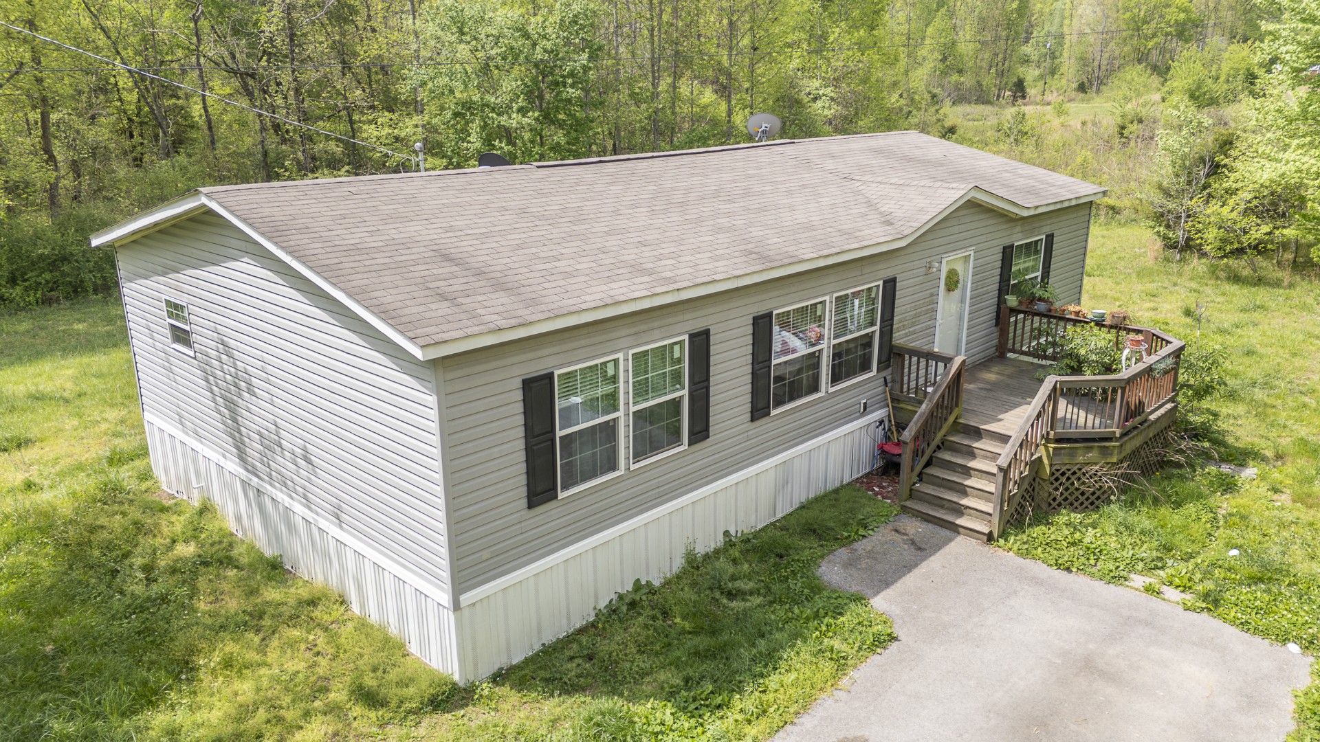 a aerial view of a house with a yard