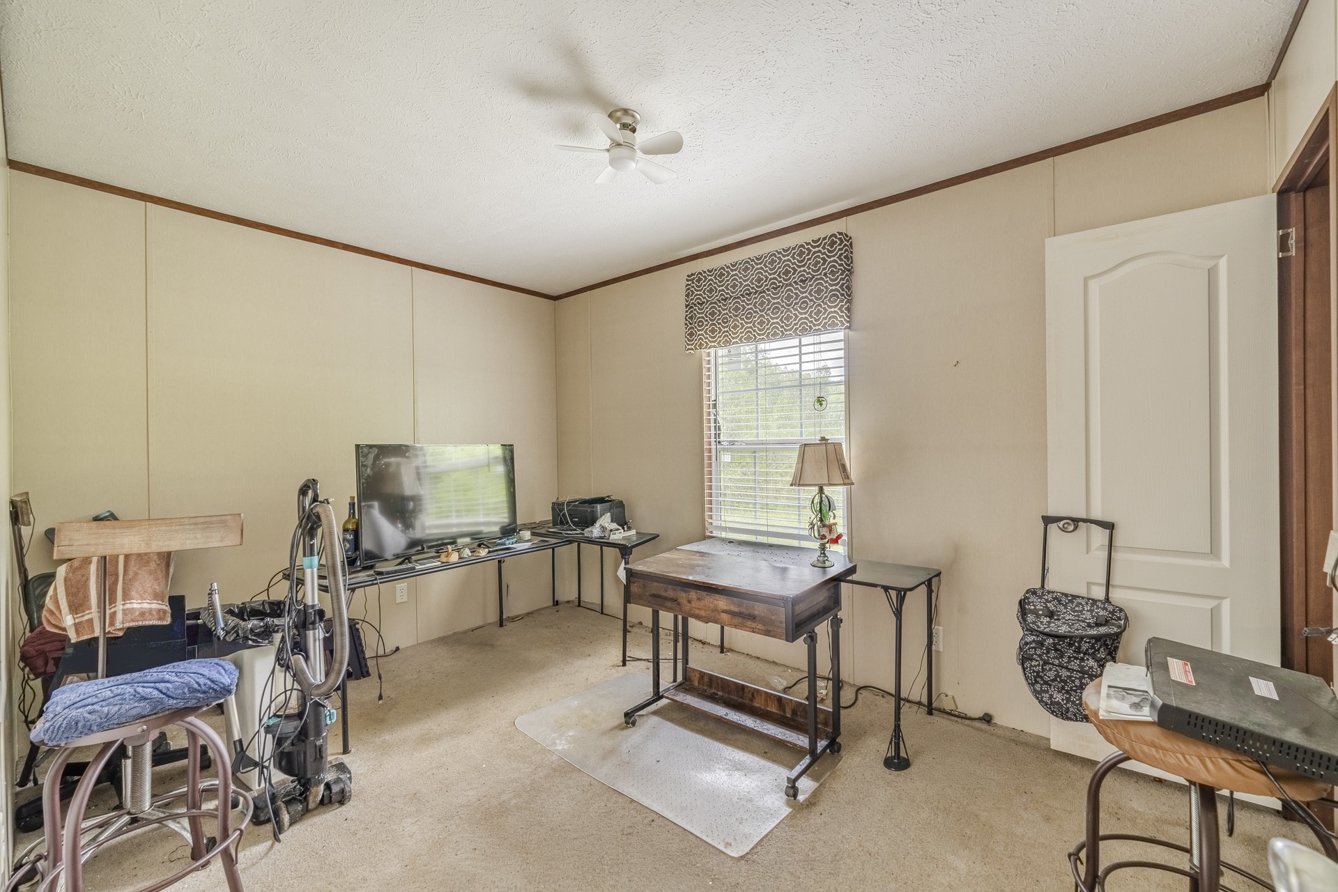 4242 Upper Factory Creek Road Waynesboro, TN 38485 - Photo 15 of 30 a living room with furniture a rug and a window