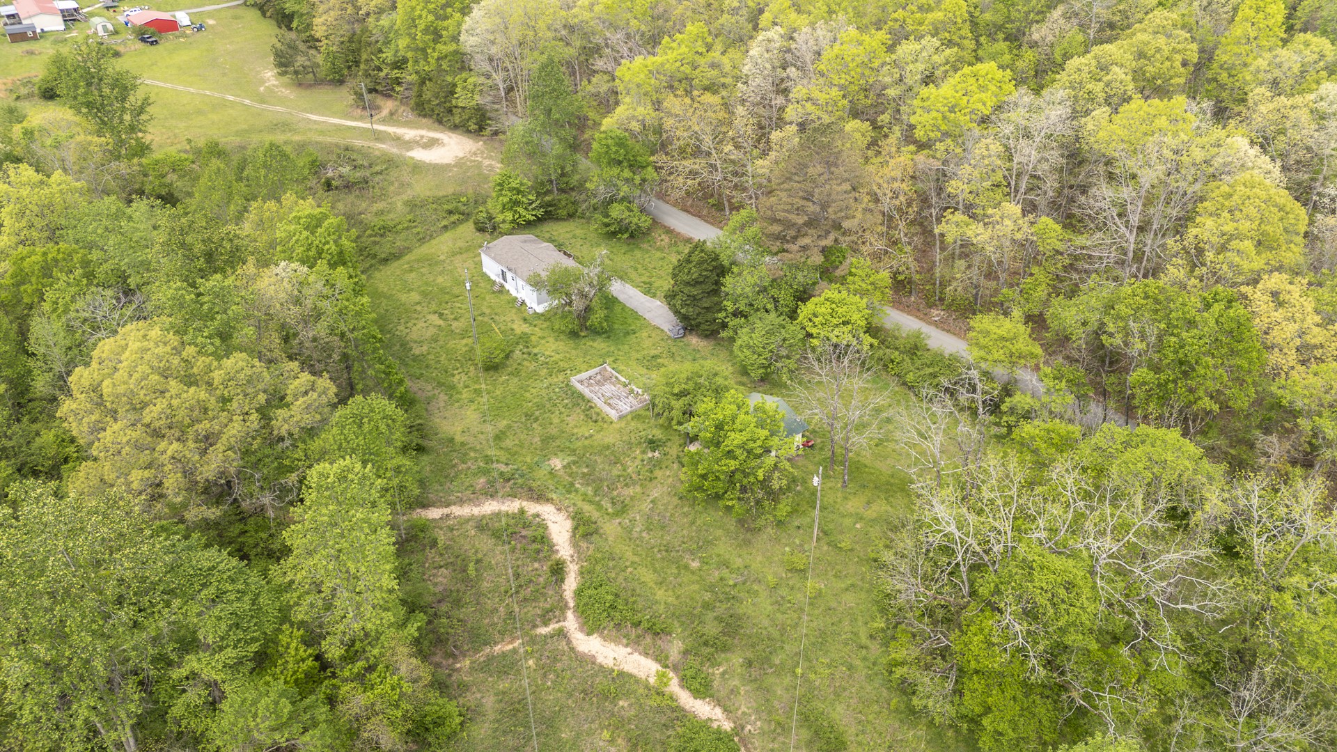 4242 Upper Factory Creek Road Waynesboro, TN 38485 - Photo 26 of 30 a view of a big yard with large trees