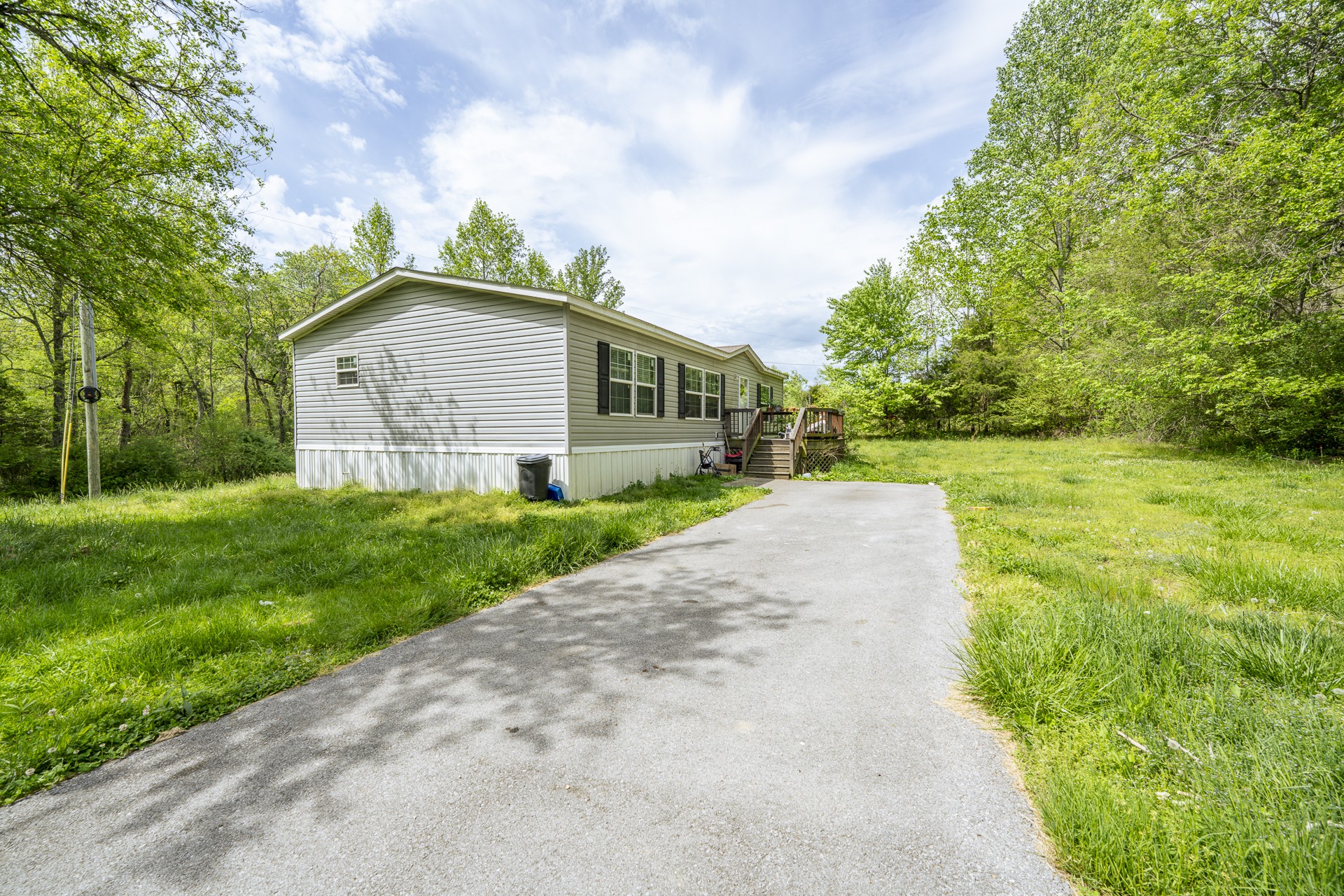 4242 Upper Factory Creek Road Waynesboro, TN 38485 - Photo 3 of 30 a view of a yard in front of house
