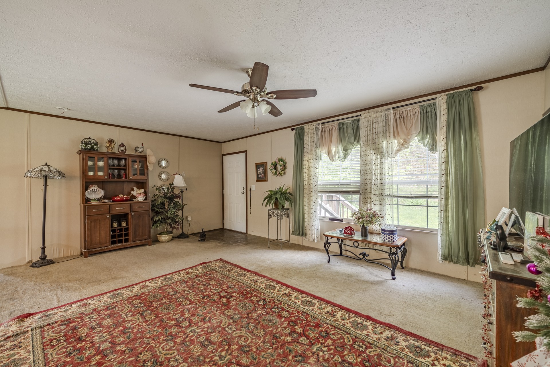 4242 Upper Factory Creek Road Waynesboro, TN 38485 - Photo 6 of 30 a living room with furniture and a large window