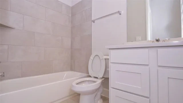 a view of house with backyard