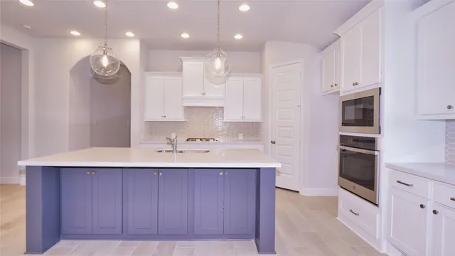 a view of kitchen and windows