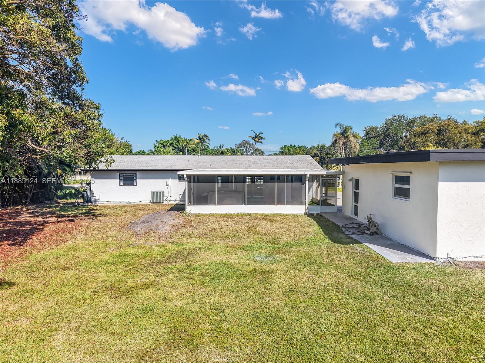 6231 Southwest 188th Avenue Southwest Ranches, FL 33332 - Photo 14 of 40 a view of a house with a yard