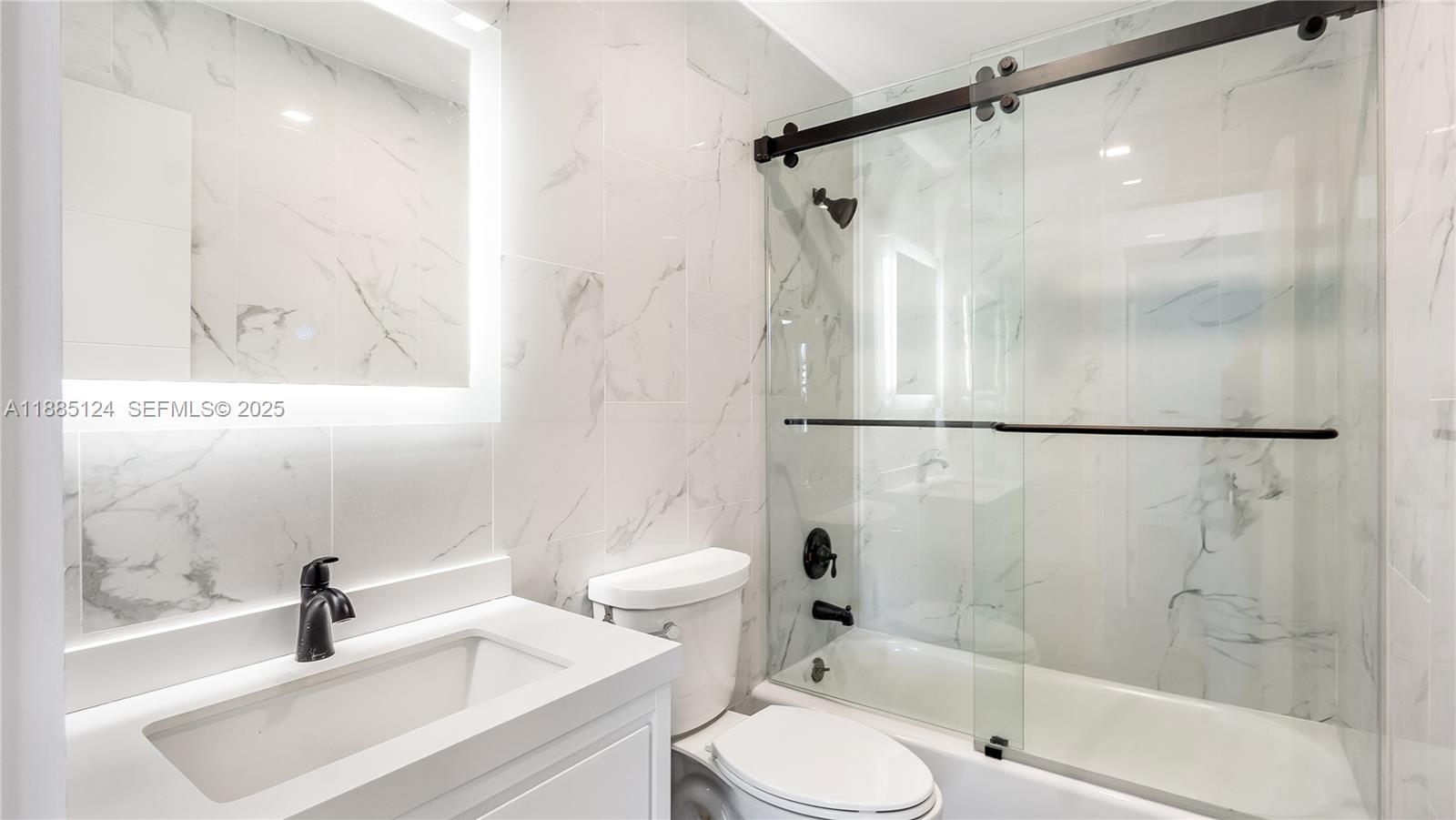 6231 Southwest 188th Avenue Southwest Ranches, FL 33332 - Photo 24 of 40 a bathroom with a sink toilet and shower