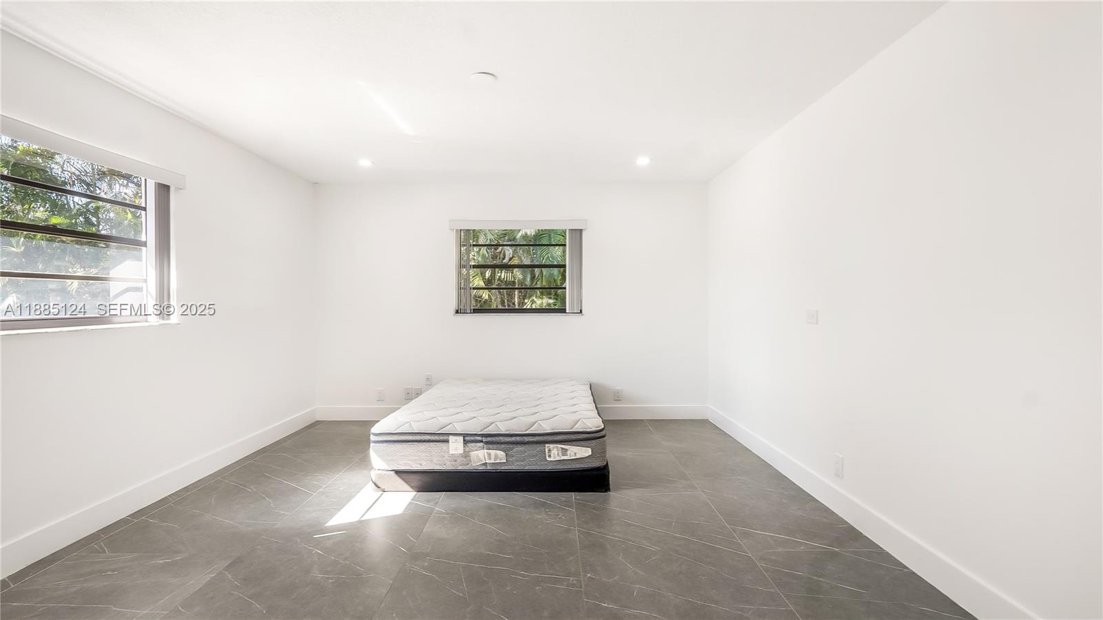 6231 Southwest 188th Avenue Southwest Ranches, FL 33332 - Photo 26 of 40 a room with a bed