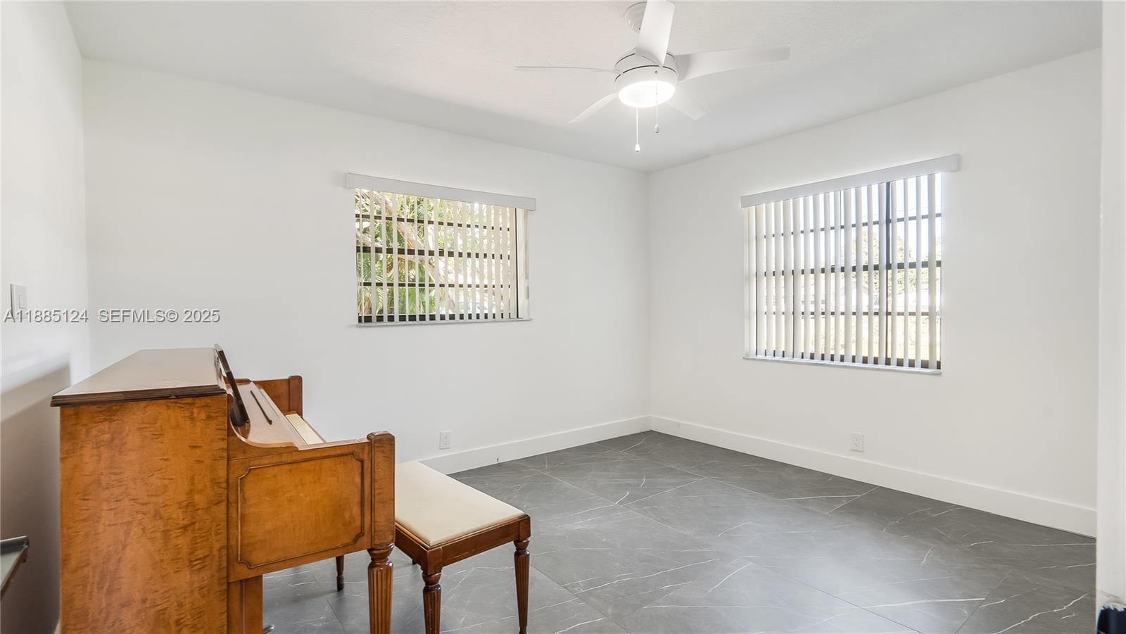 6231 Southwest 188th Avenue Southwest Ranches, FL 33332 - Photo 30 of 40 a view of room with window and ceiling fan