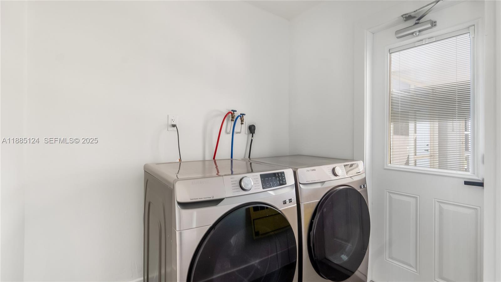 6231 Southwest 188th Avenue Southwest Ranches, FL 33332 - Photo 32 of 40 a utility room with dryer and washer