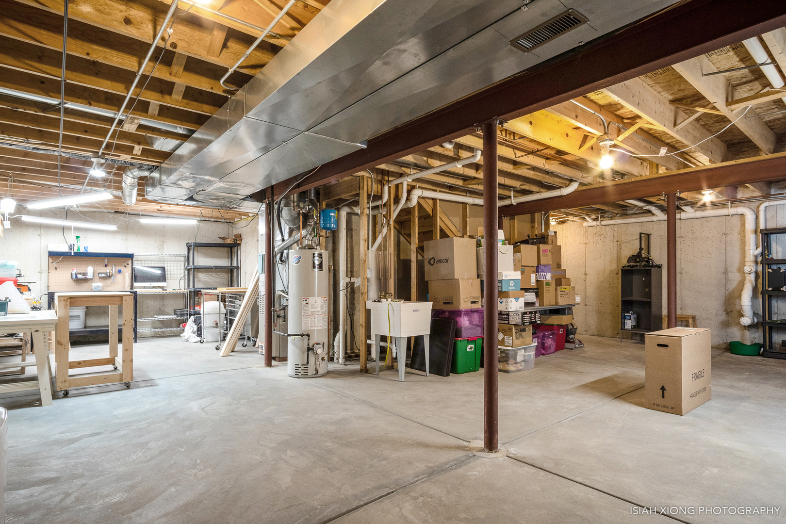 606 Ramsden Road Plano, IL 60545 - Photo 22 of 25 a view of a garage with wooden table and chairs