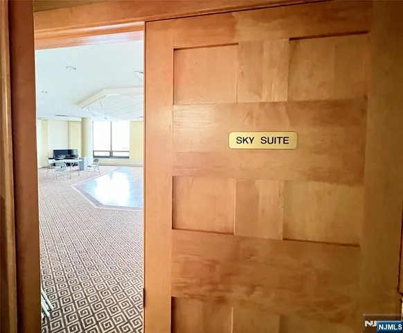 a indoor swimming pool with outdoor seating