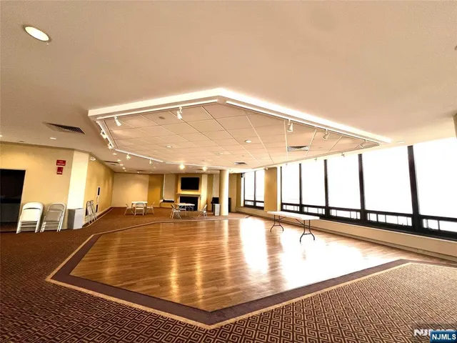 a room with lots of gym equipment