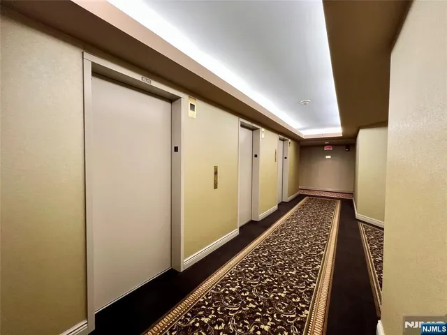 a workspace room with furniture window and book shelf