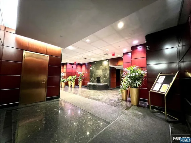 a view of a chairs and table in a room