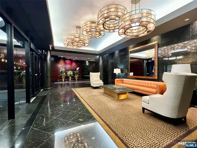 a view of a patio with a table and chairs