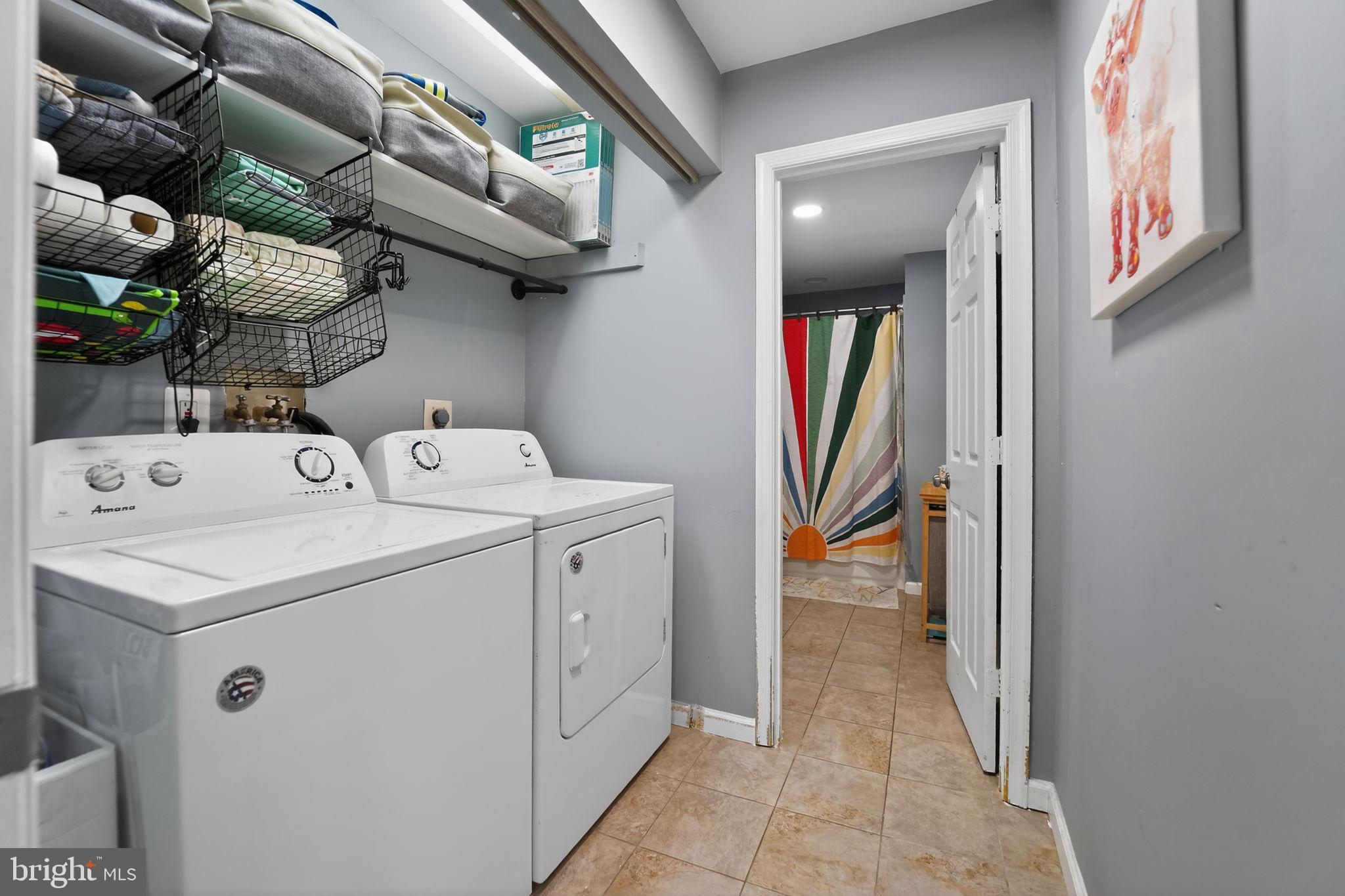 7819 Bertha Road Pasadena, MD 21122 - Photo 18 of 31 a utility room with dryer and washer