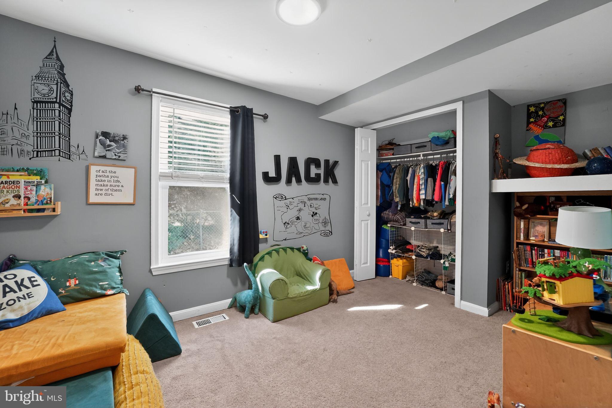 7819 Bertha Road Pasadena, MD 21122 - Photo 21 of 31 a living room with lots of furniture and a window