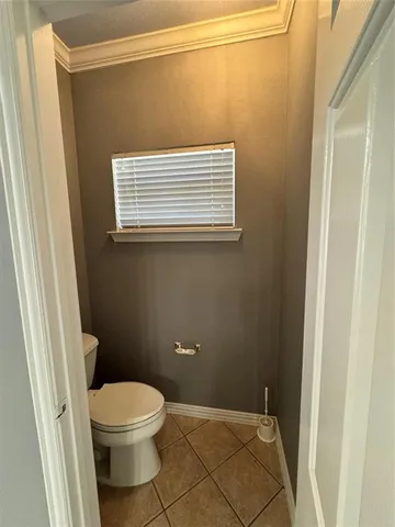 a view of walk in closet with wooden floor
