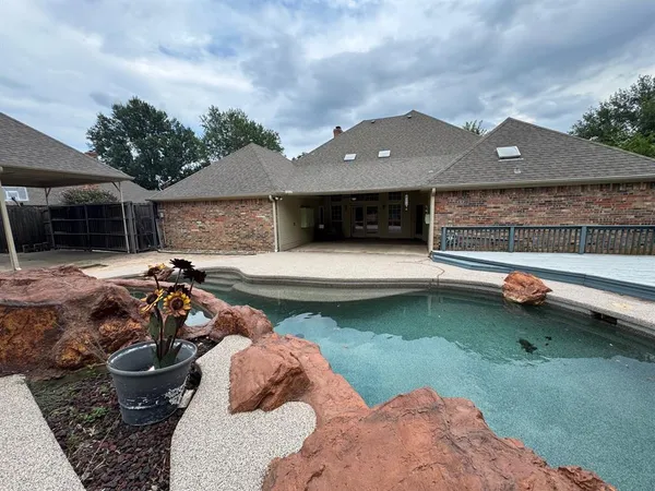 a view of a backyard with a garden