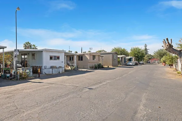 a view of a street with cars