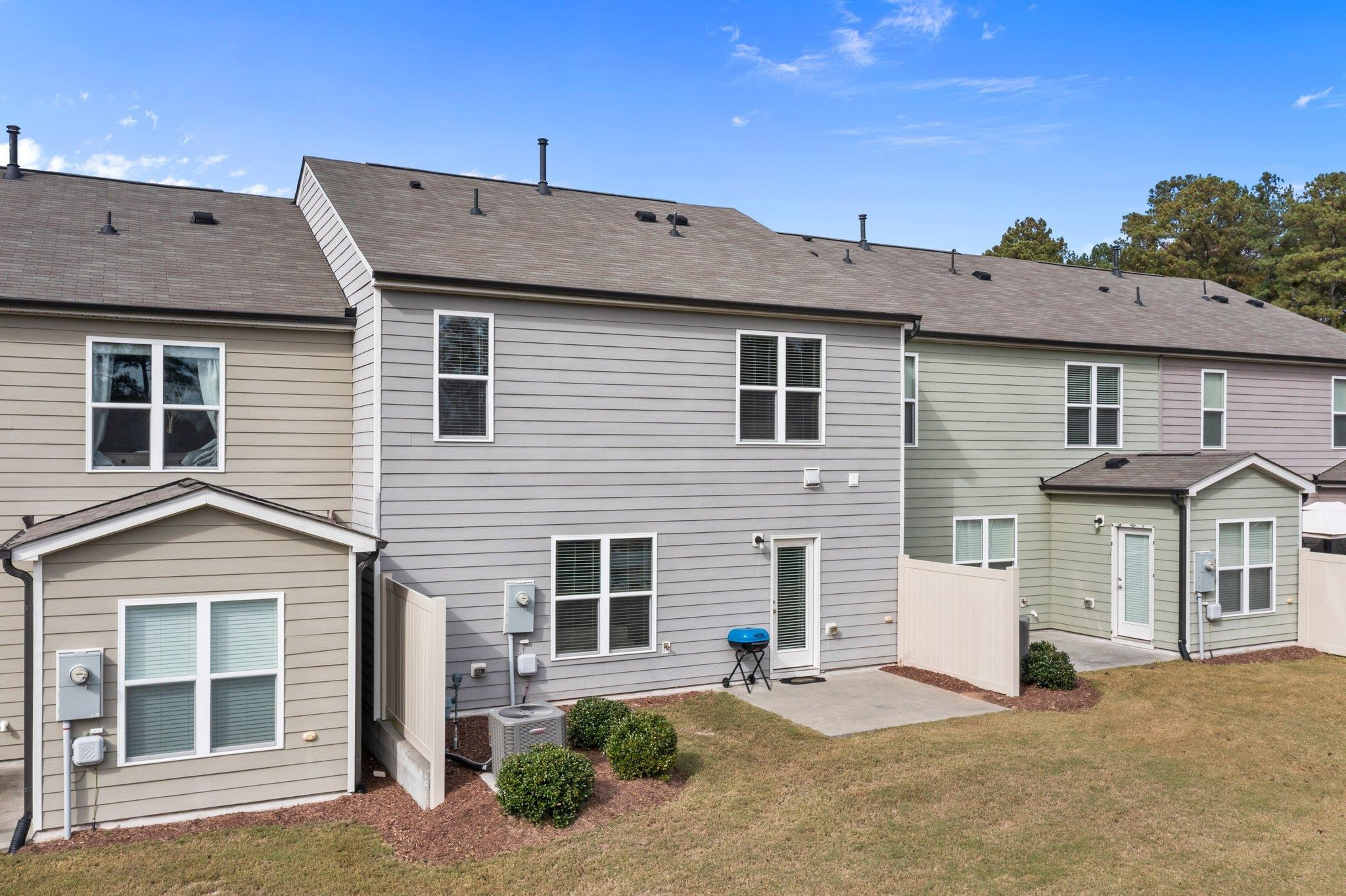 1022 Saffron Loop Durham, NC 27713 - Photo 19 of 22 a front view of a house with a yard