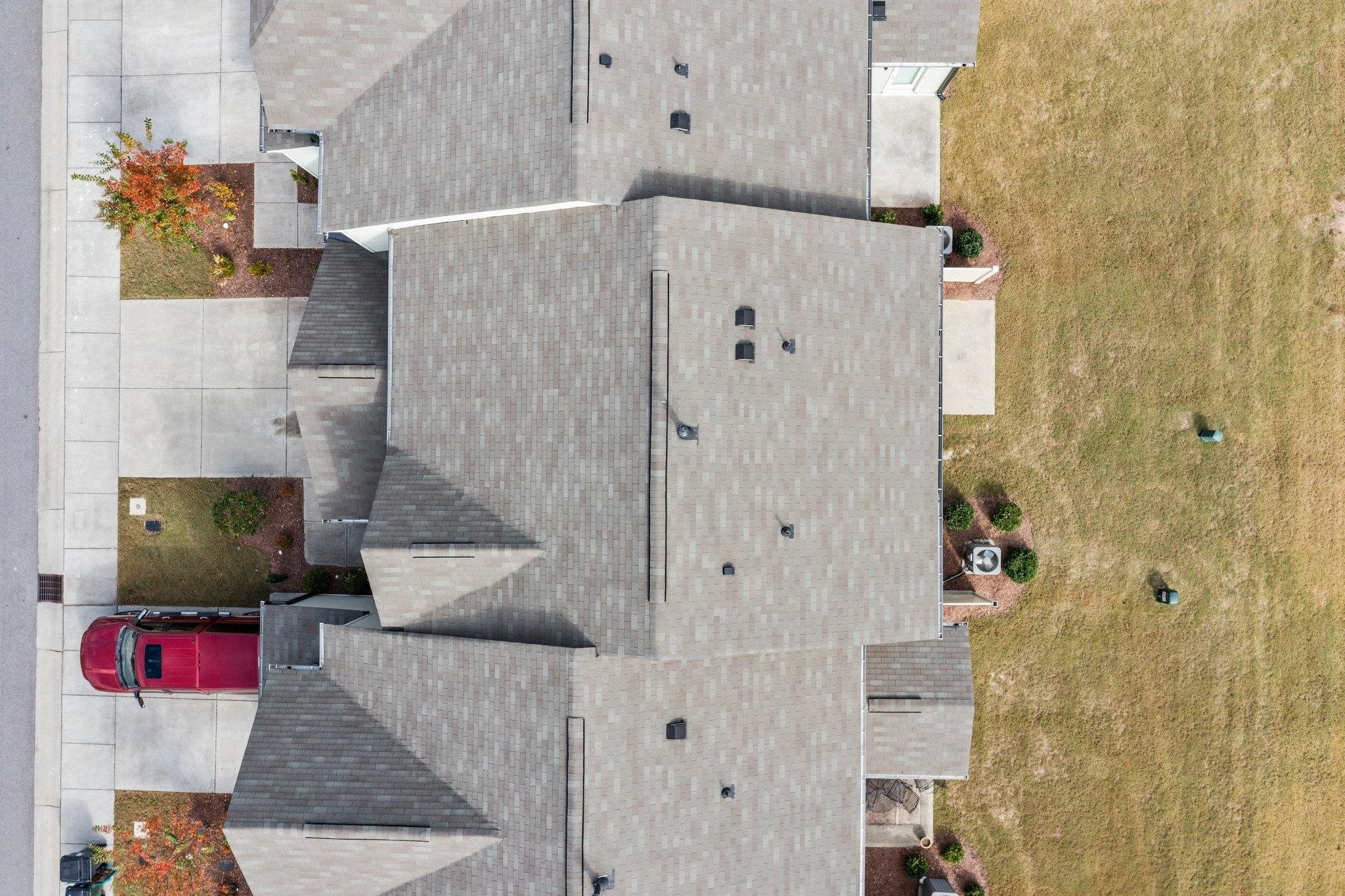 1022 Saffron Loop Durham, NC 27713 - Photo 20 of 22 a bathroom with a shower