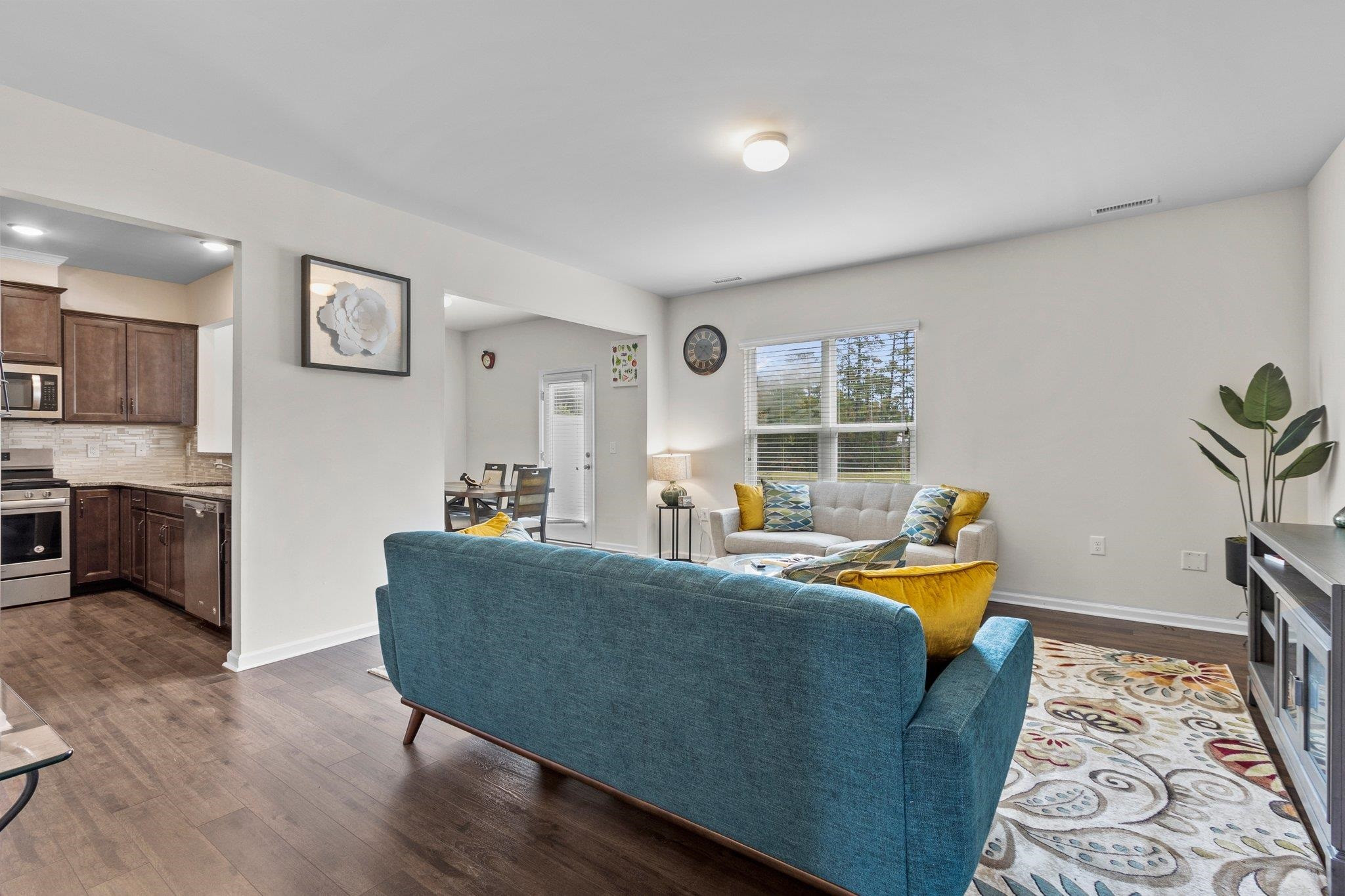1022 Saffron Loop Durham, NC 27713 - Photo 4 of 22 a living room with furniture and a window