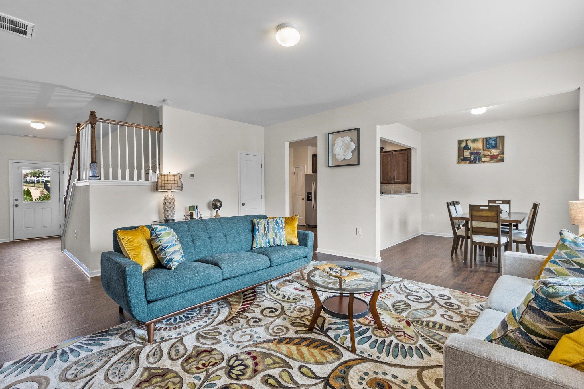 1022 Saffron Loop Durham, NC 27713 - Photo 5 of 22 a living room with furniture and wooden floor