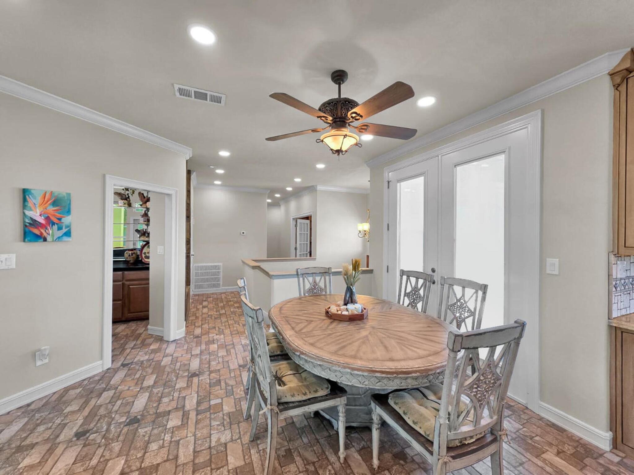 425 Island Way Port Arthur, TX 77640 - Photo 11 of 49 a view of a dining room with furniture and a chandelier