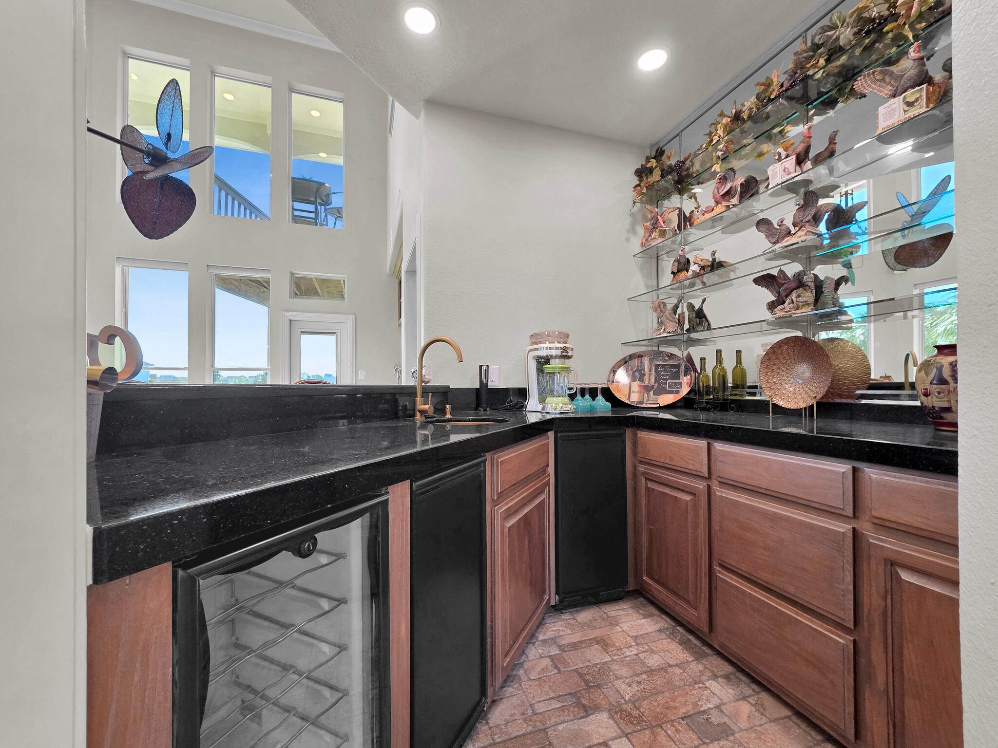 425 Island Way Port Arthur, TX 77640 - Photo 14 of 49 a kitchen with a sink and a stove