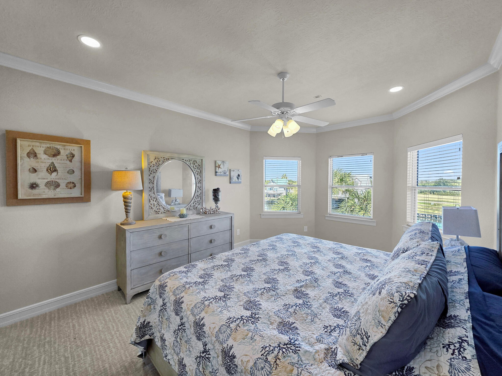 425 Island Way Port Arthur, TX 77640 - Photo 17 of 49 a bedroom with a bed and a dresser