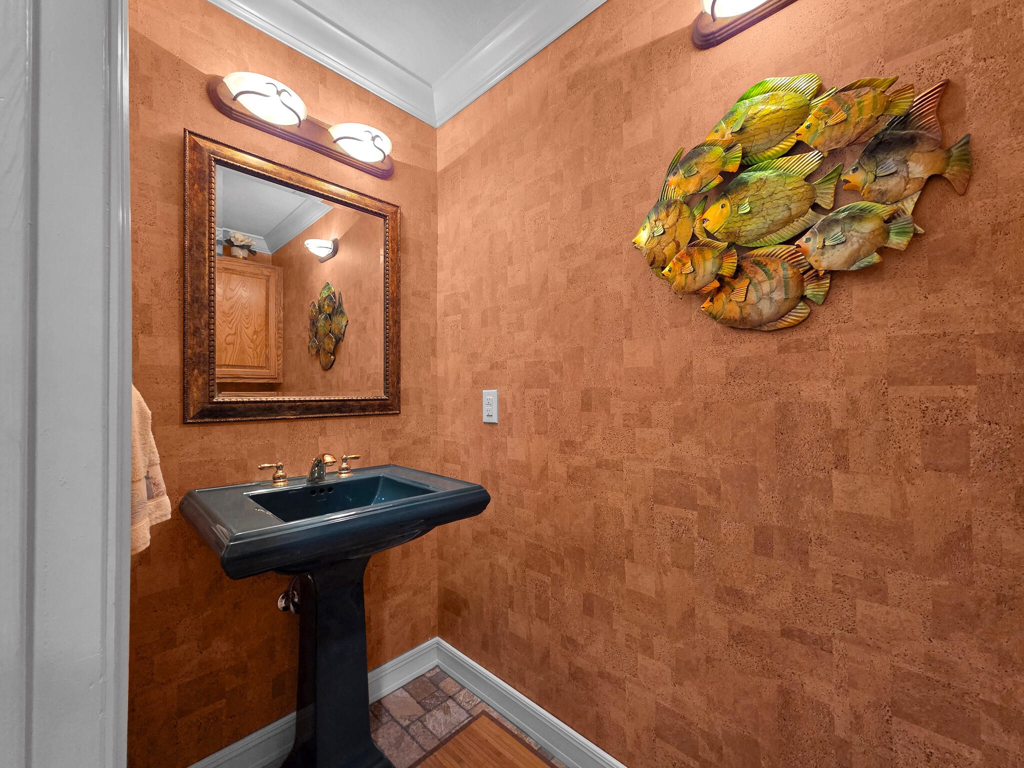425 Island Way Port Arthur, TX 77640 - Photo 22 of 49 a bathroom with a sink and mirror