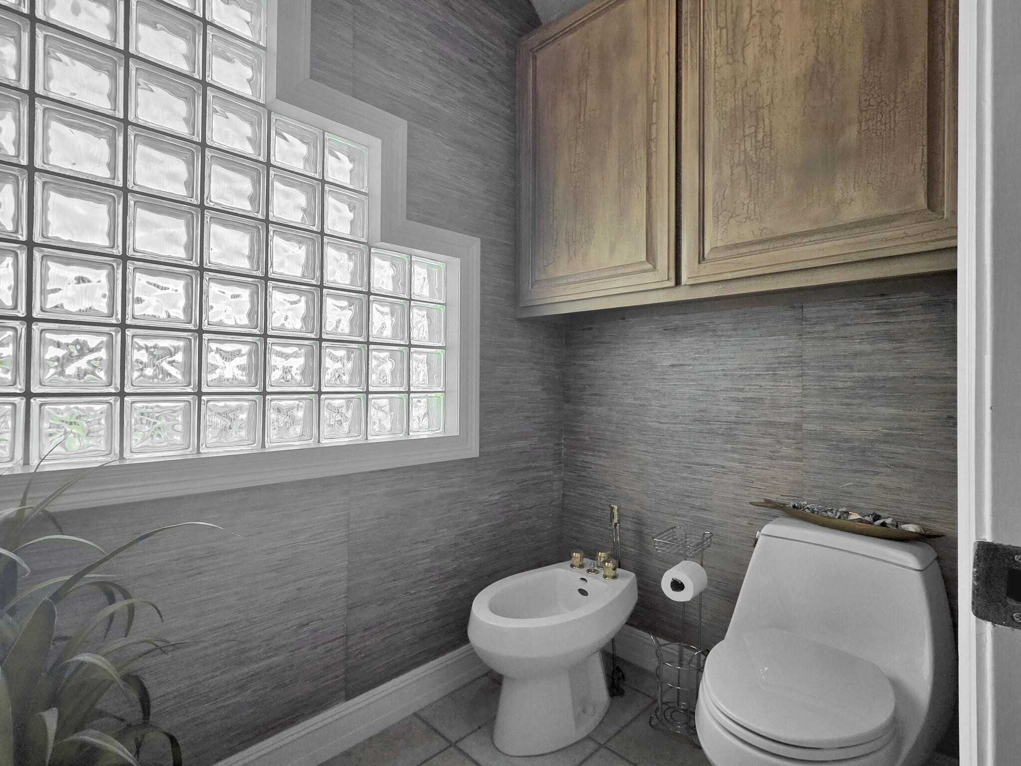 425 Island Way Port Arthur, TX 77640 - Photo 32 of 49 a white toilet sitting next to a window