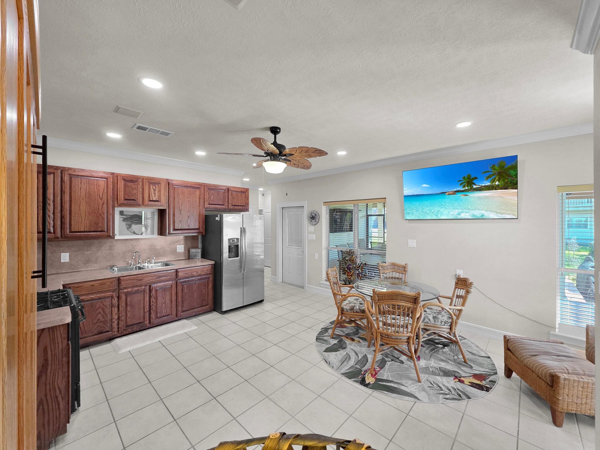 425 Island Way Port Arthur, TX 77640 - Photo 35 of 49 a kitchen with stainless steel appliances kitchen island granite countertop a sink and cabinets