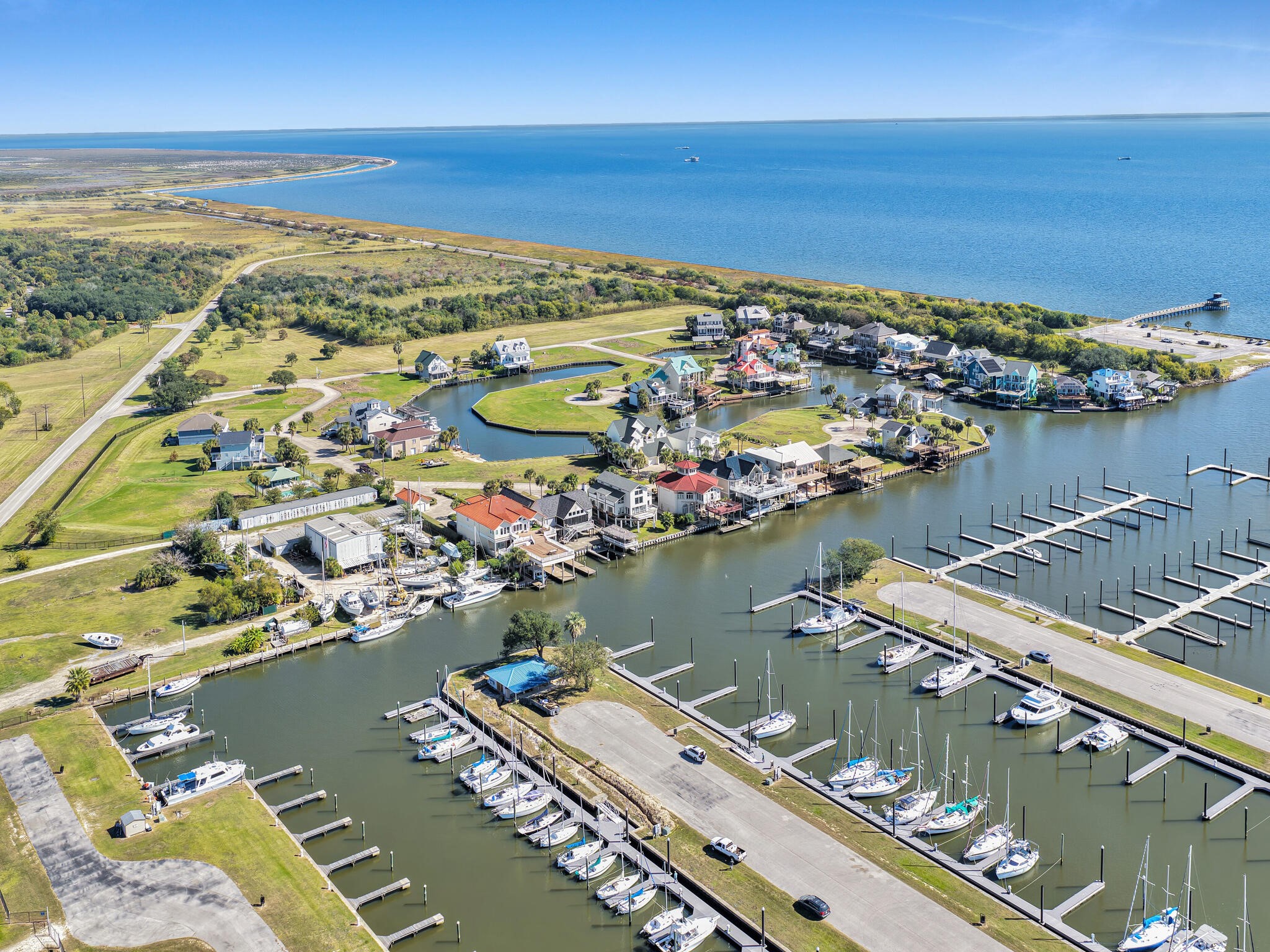 425 Island Way Port Arthur, TX 77640 - Photo 4 of 49 a view of a city with an ocean