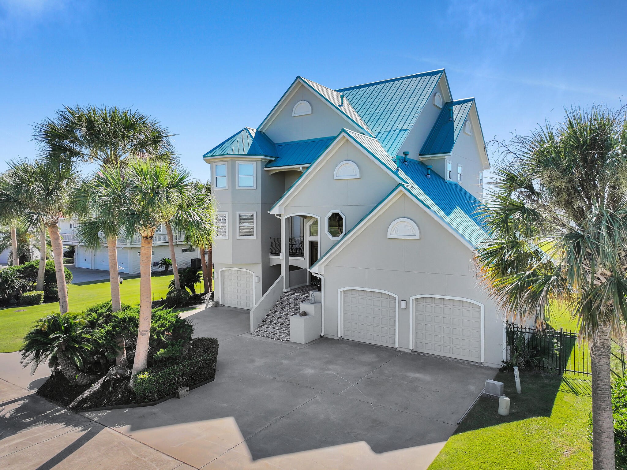 425 Island Way Port Arthur, TX 77640 - Photo 44 of 49 a view of a house with a yard and potted plants