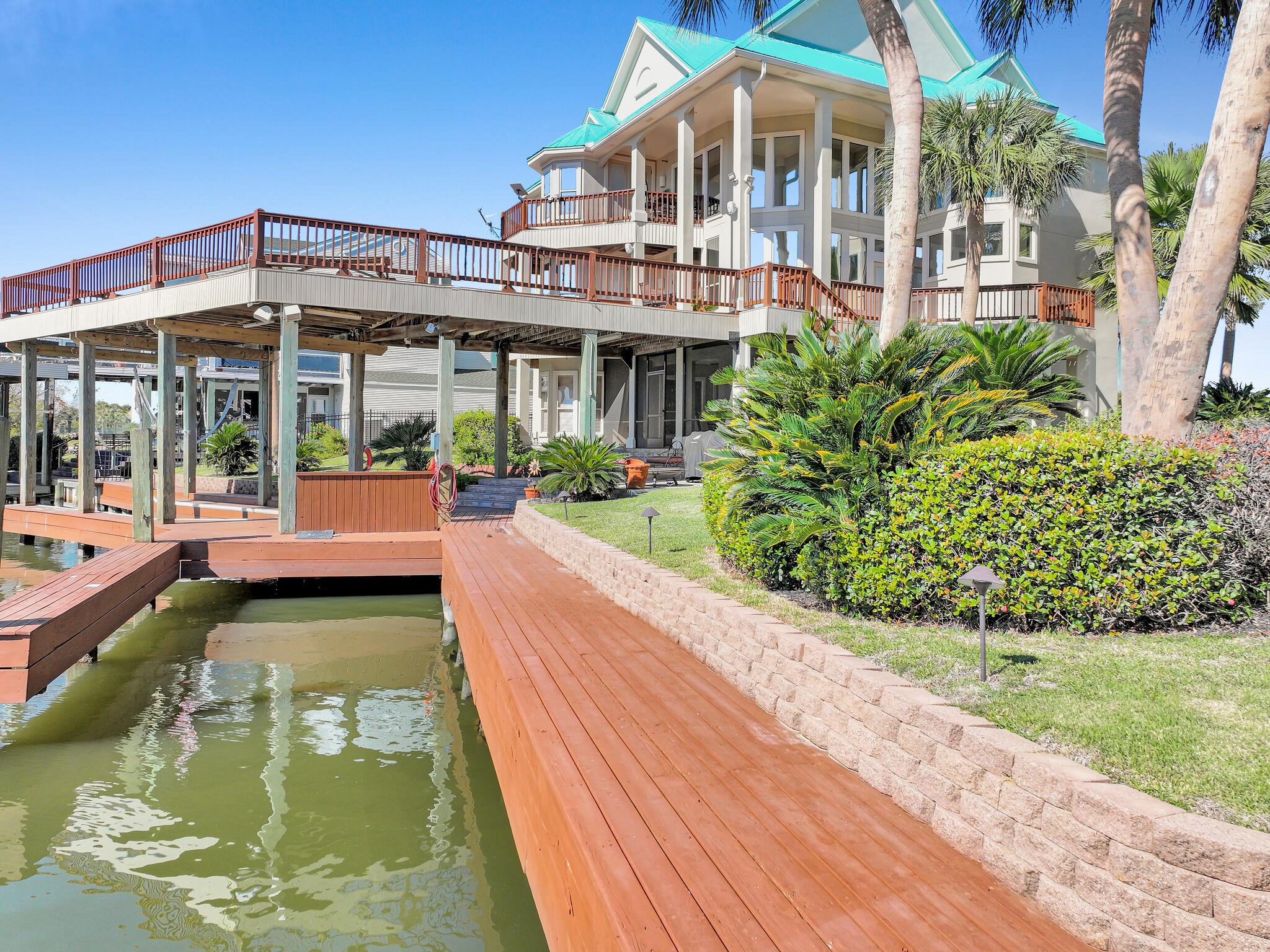 425 Island Way Port Arthur, TX 77640 - Photo 45 of 49 swimming pool view with a garden space