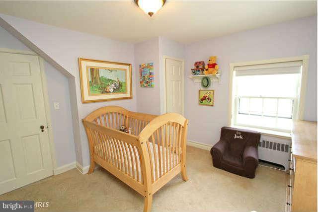 1200 Poplar Hill Road Baltimore, MD 21210 - Photo 9 of 18 a living room with furniture and a window