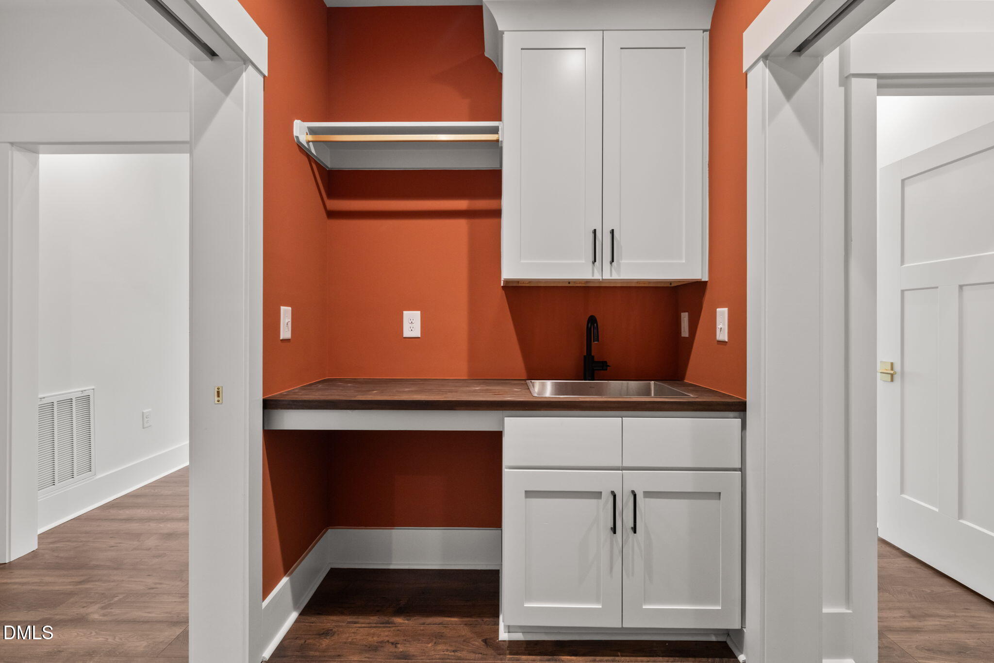 340 Pilot Ridge Road Zebulon, NC 27597 - Photo 30 of 52 a room with wooden cabinets and a window