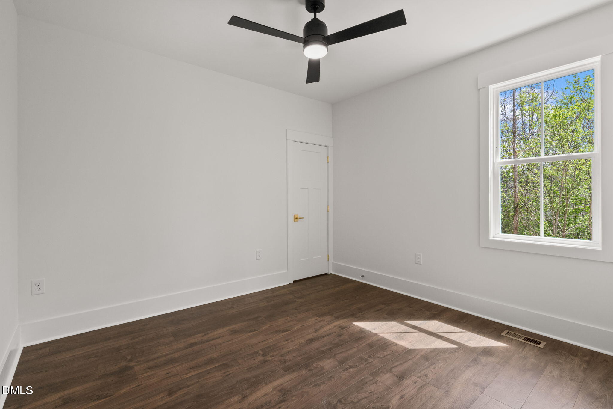 340 Pilot Ridge Road Zebulon, NC 27597 - Photo 38 of 53 a view of a room with wooden floor and windows