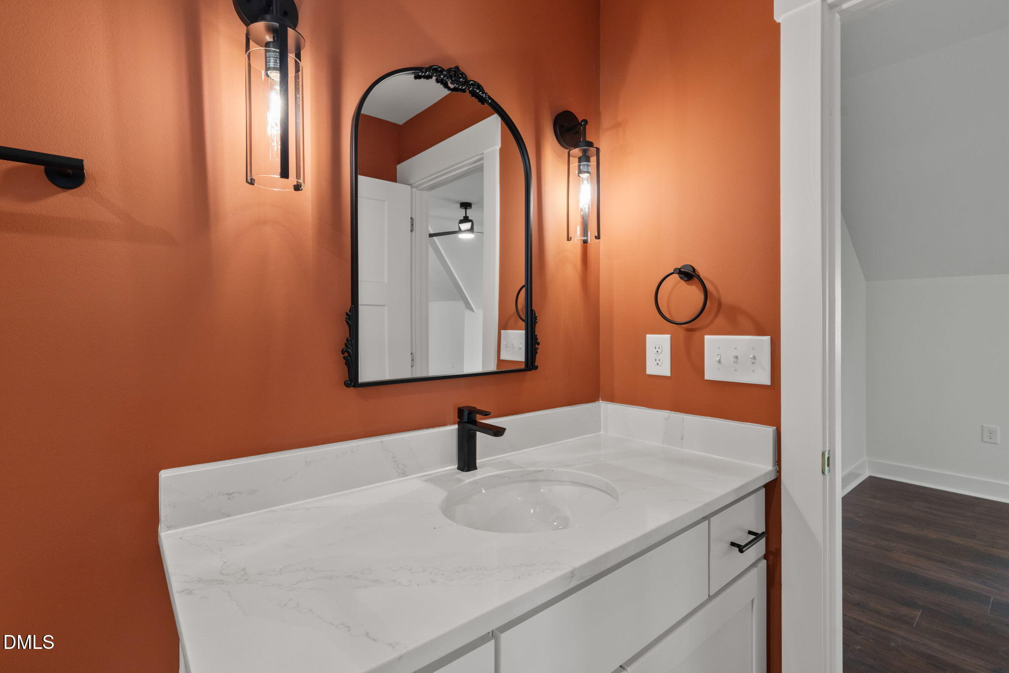 340 Pilot Ridge Road Zebulon, NC 27597 - Photo 41 of 52 a bathroom with a sink and a mirror