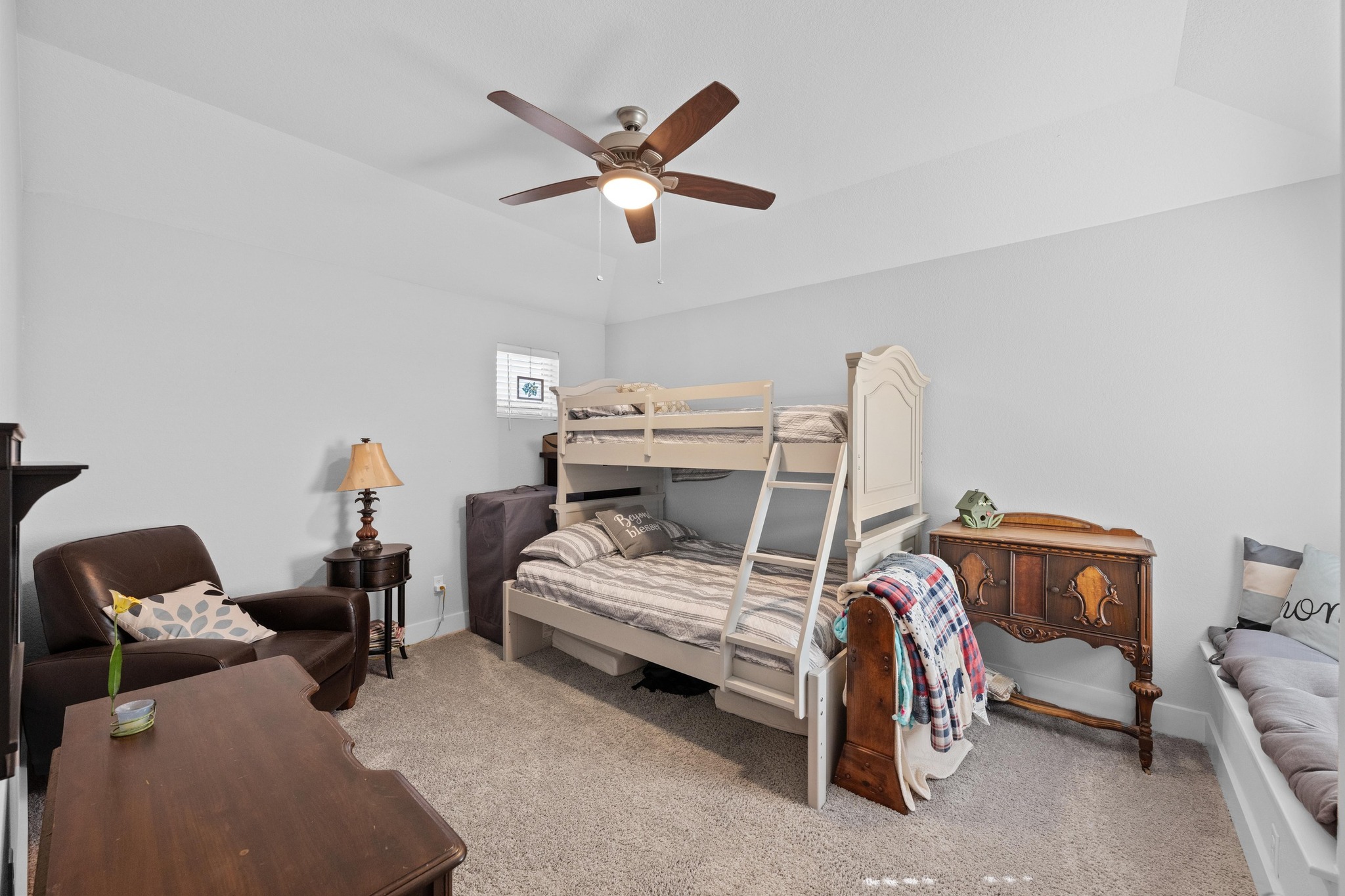 217 Palio Place Georgetown, TX 78628 - Photo 25 of 40 a bedroom with a bed and a chandelier