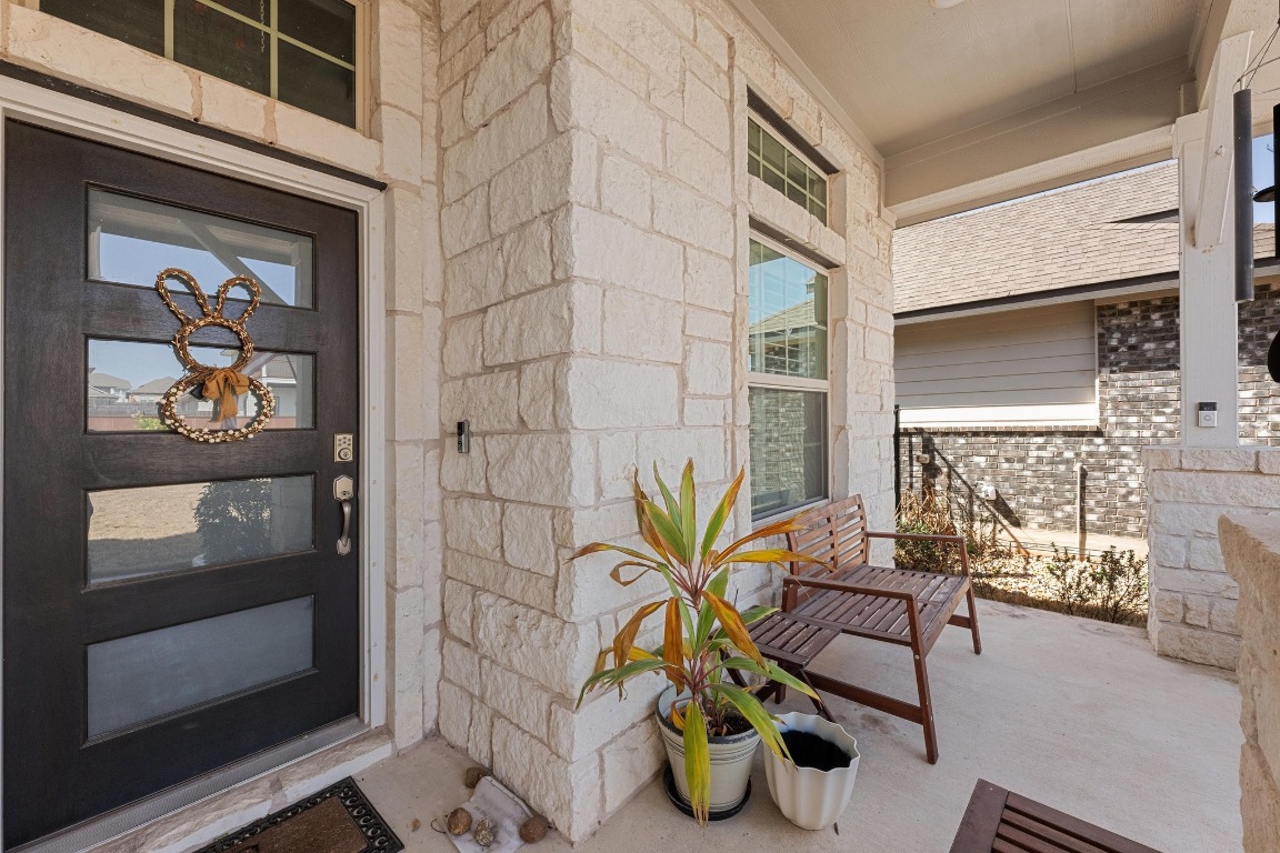 217 Palio Place Georgetown, TX 78628 - Photo 3 of 40 a building outdoor space with patio furniture and potted plant