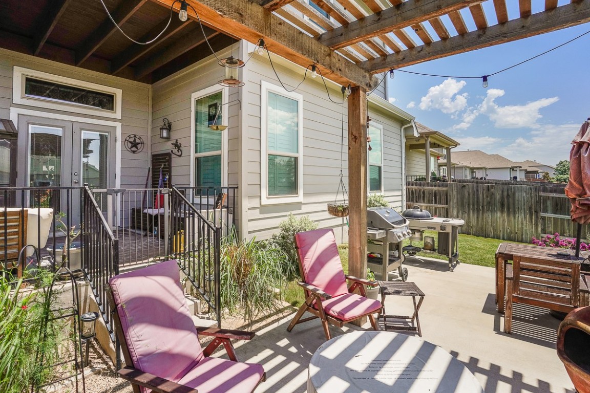 217 Palio Place Georgetown, TX 78628 - Photo 31 of 40 a view of living room filled with furniture and outdoor seating