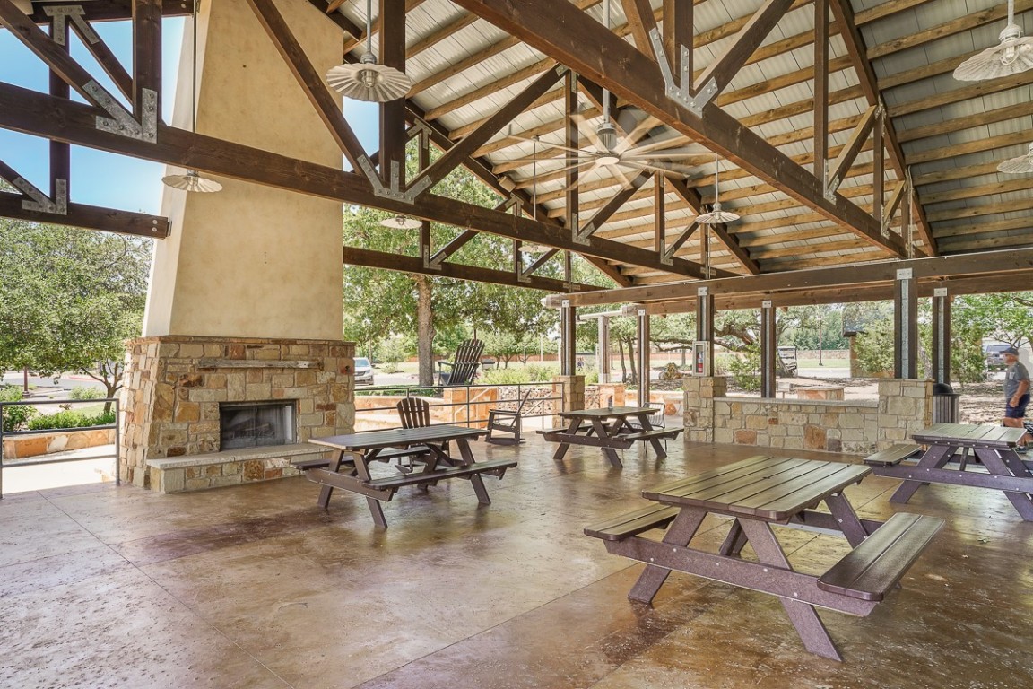 217 Palio Place Georgetown, TX 78628 - Photo 38 of 40 a living room with fireplace furniture and a fireplace