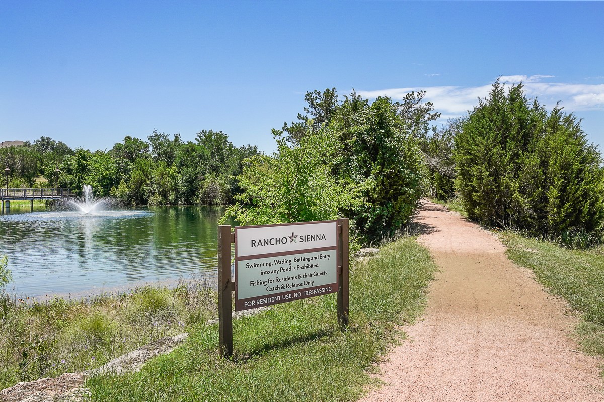 217 Palio Place Georgetown, TX 78628 - Photo 39 of 40 a view of a garden with water view