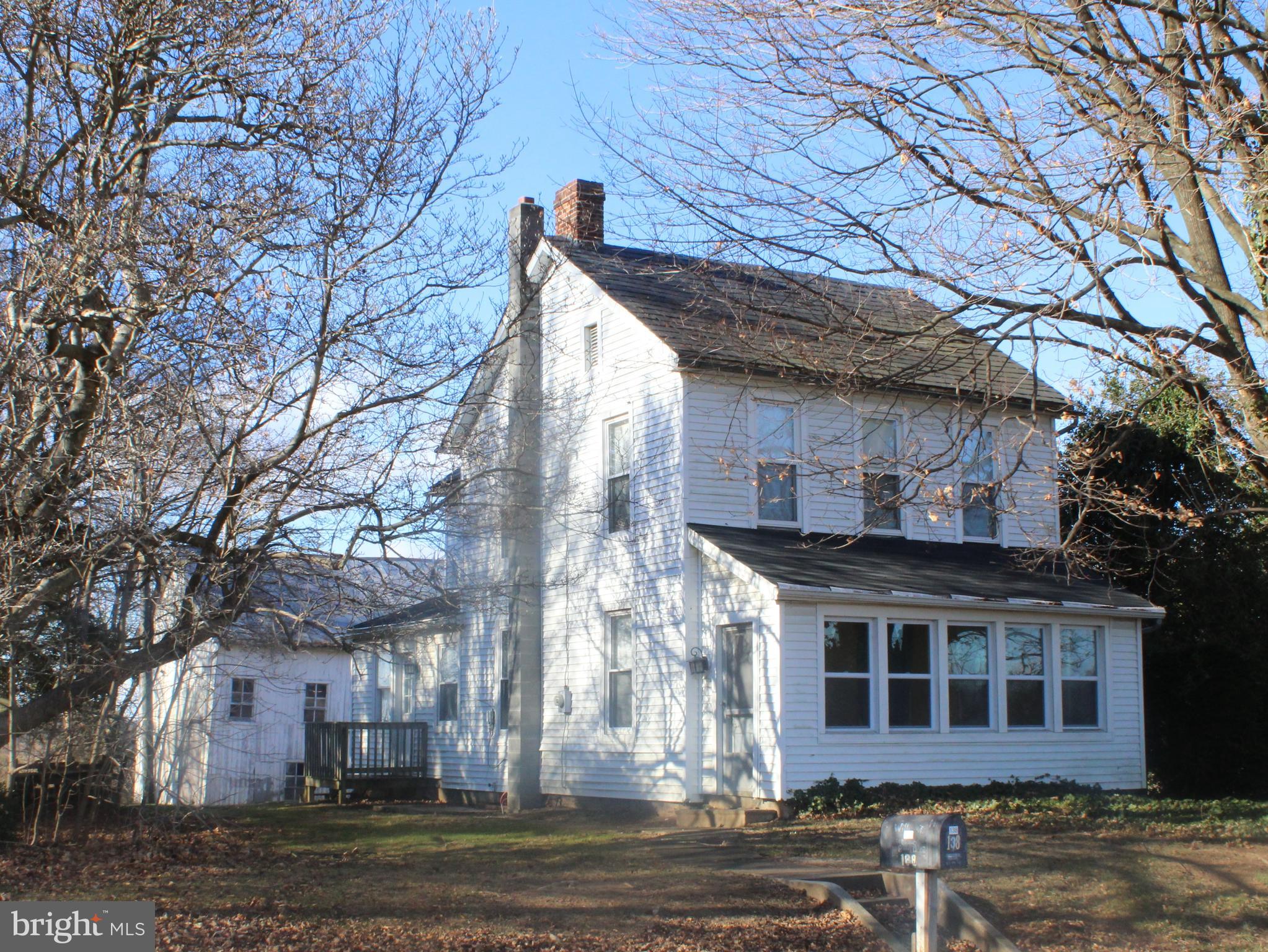 a view of a building with a yard