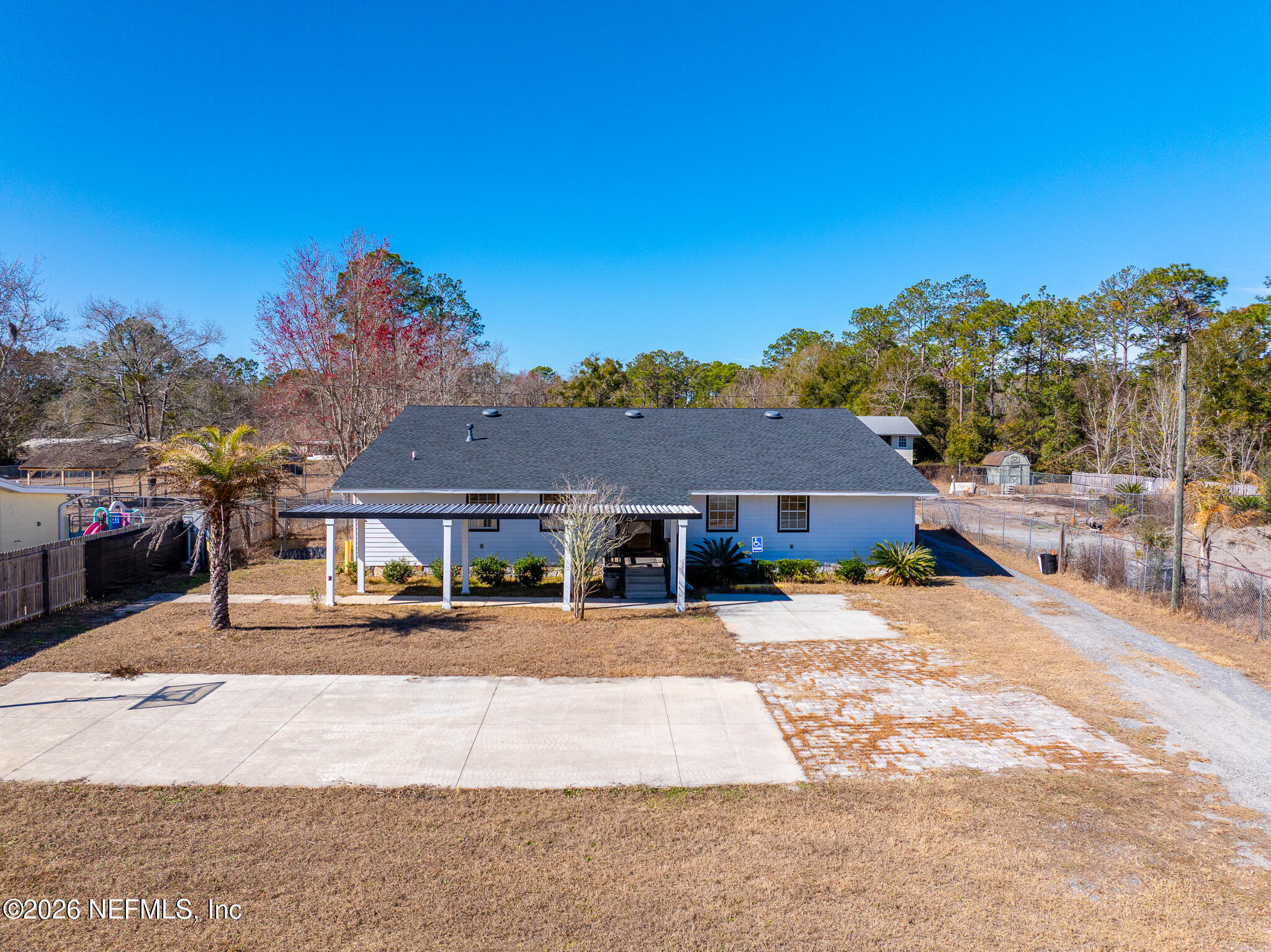 35 Cinnamon Street Middleburg, FL 32068 - Photo 11 of 56 a view of a house with a patio