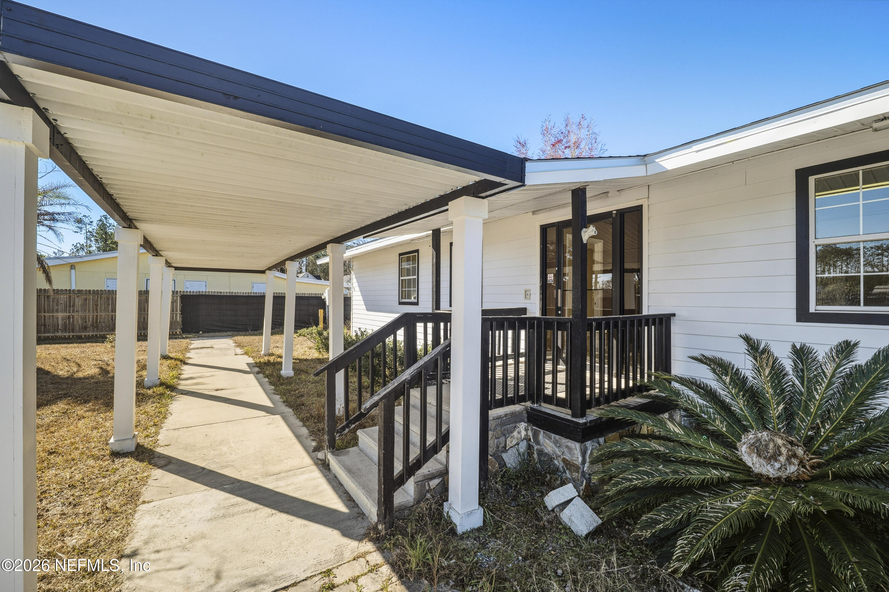 35 Cinnamon Street Middleburg, FL 32068 - Photo 13 of 56 a view of entryway with a front door